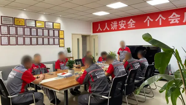OTTMEL team meeting at the factory in Dongying (faces blurred)